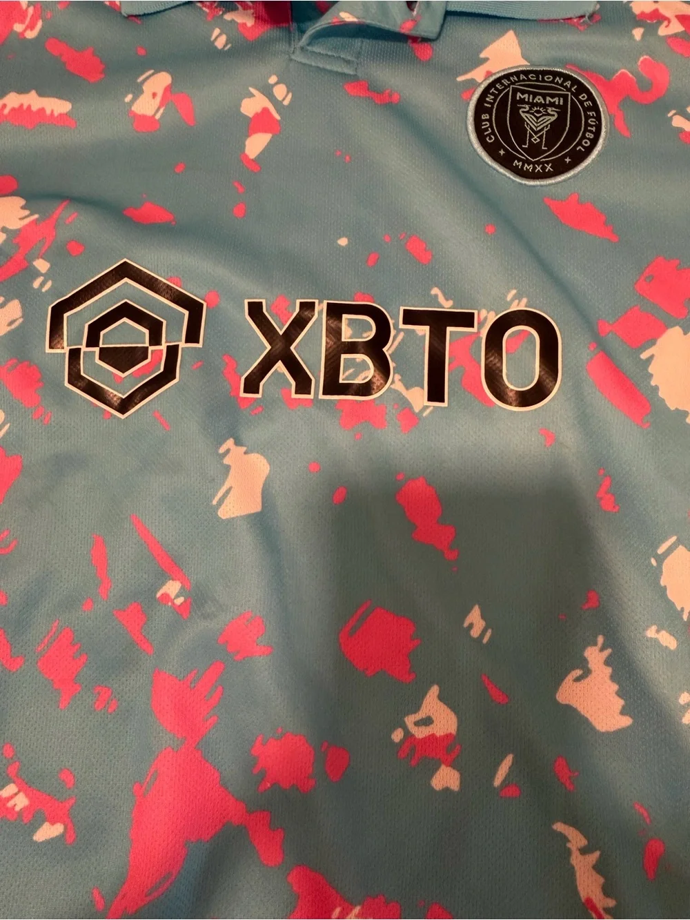 Kids' Aqua Polo with Pink & White Splash Print, team copy Messi size Large